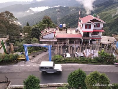 The toy train passing on the lane below the homestay